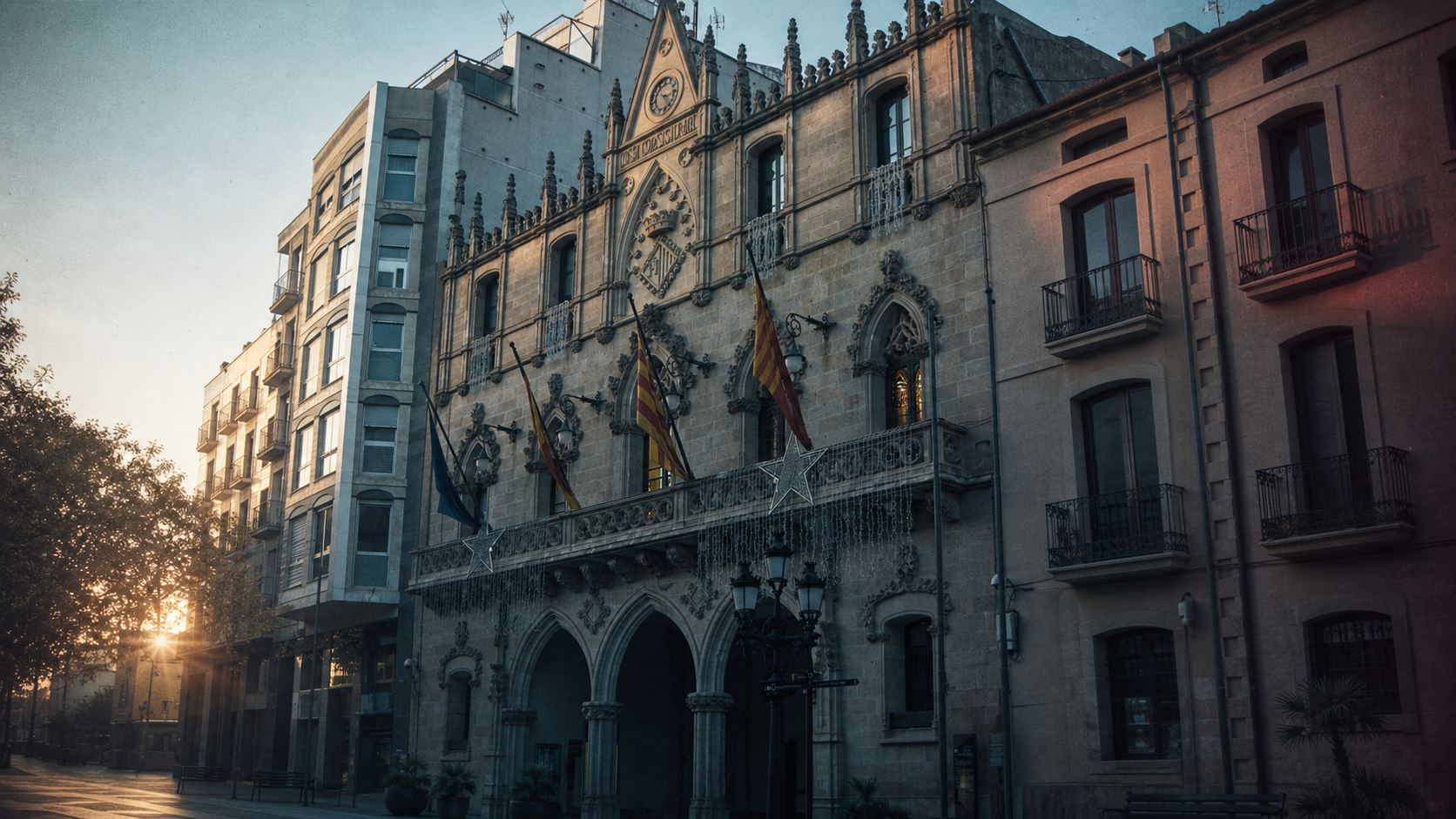 Edifici institucional de Terrassa fotografiat amb llum urbana i una intervenció gràfica editorial molt subtil.