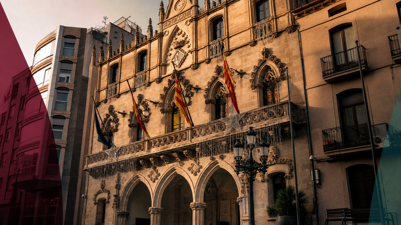 Façana de l’Ajuntament de Terrassa amb una intervenció editorial subtil en carmí i blau mineral.